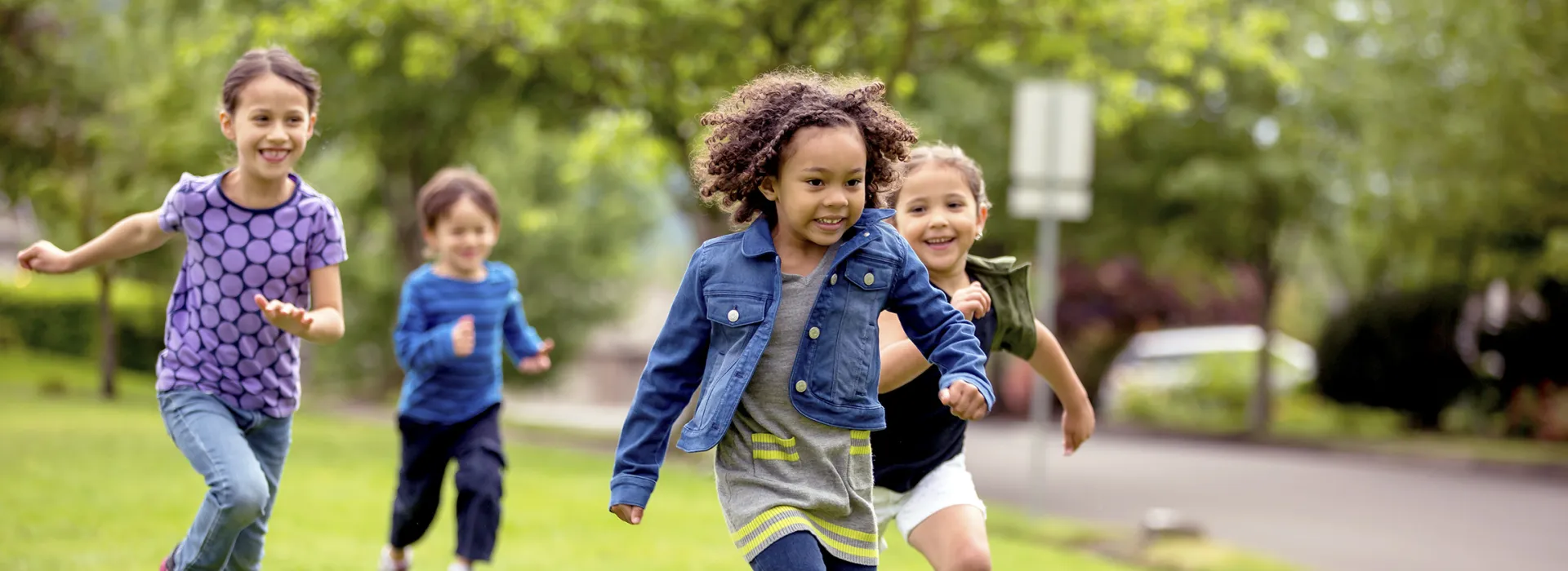 group of kids running and playing